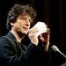 Author Neil Gaiman gestures with a stack of question and answer notecards at the Michigan Theater on Sunday, July 7. Daniel Brenner I AnnArbor.com